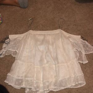 white loose detailed with tassel on sleeve